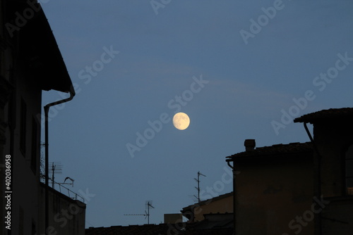 moon over buildings