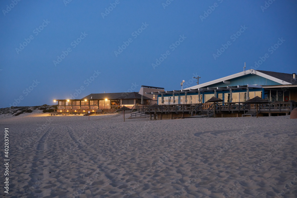 Beach bar restaurants at night in Comporta, Portugal Beach bar restaurants at night in Comporta, Portugal