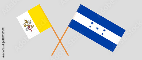 Crossed flags of Vatican and Honduras