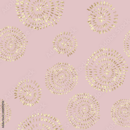 Abstract seamless pattern with golden glittering acrylic paint round spiral circles on pink background