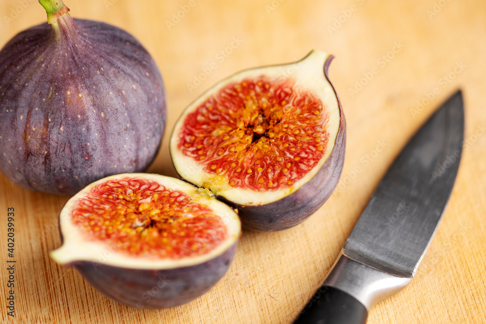 Ripe figs on a slate stone cutting board,selective focus Ripe figs on a slate stone cutting board,selective focus