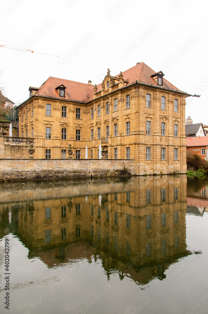 Bamberg, Germany, 20.12.2020. The famous Villa Concordia is reflected in the water of the Regnitz. High quality photo