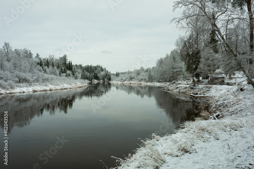 City Cesis, Latvia.River Gauja at winter, trees and snow.