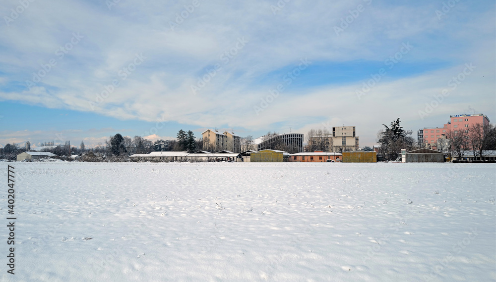 Afternoon panorama of the snowy suburbs