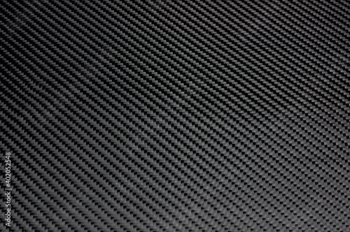 Real twill weaved carbon fiber flat texture photo
