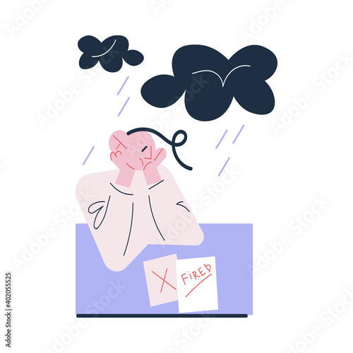 Unhappy young man worker sitting and feeling depressed with dismissal