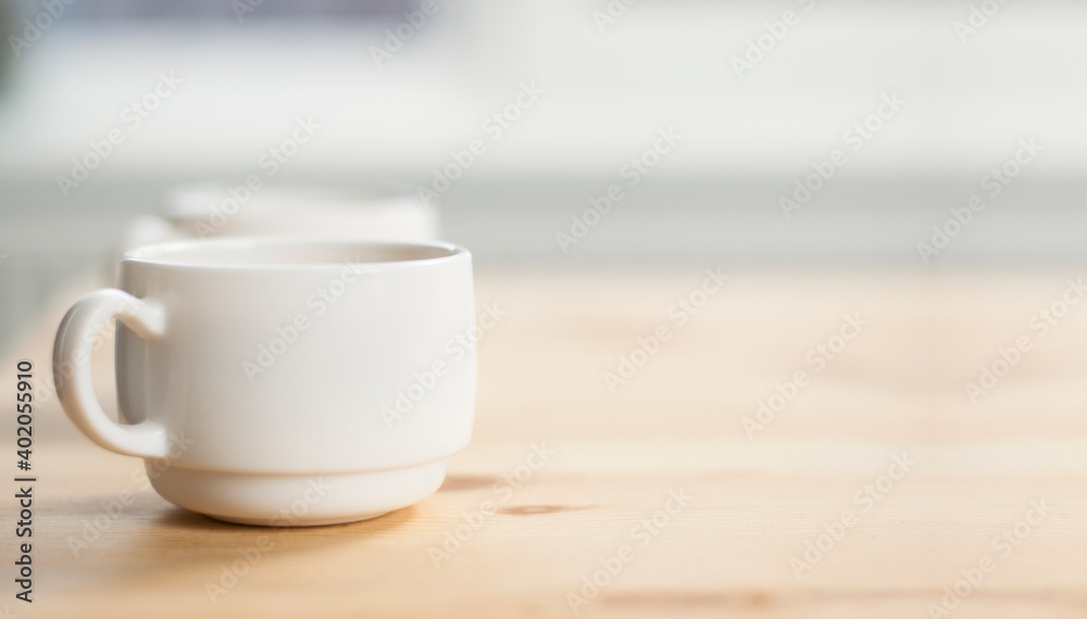 Cup of coffee on a wooden table. Breakfast morning Cup of coffee on a wooden table. Breakfast morning
