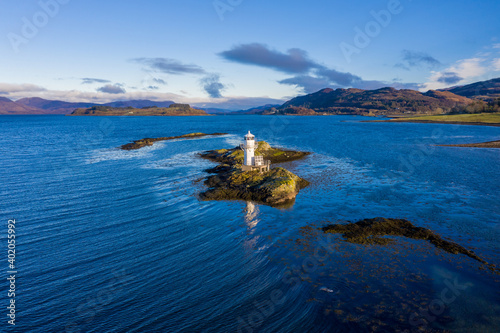 Aerial view of Sager Bhuidhe Lighthouse, loch linnhe and offshore islands on the west coast of the argyll region of the highlands of Scotland during winter photo