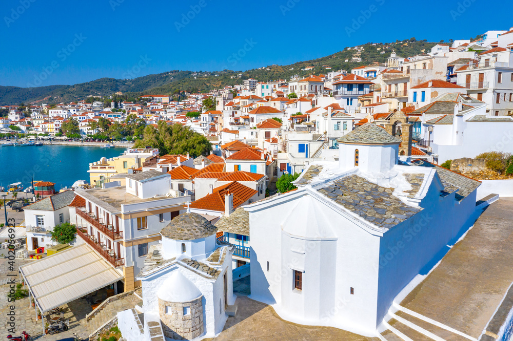 View of town and port at the island Skopelos, northern Sporades, Greece