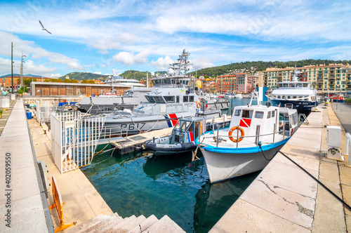 Coast Guard and Gendarmerie Maritime boats line Port Lympia, the Old Harbor Port of Nice France along the Mediterranean Sea. photo