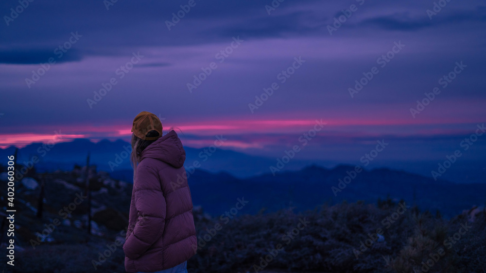 Young woman at sunset 