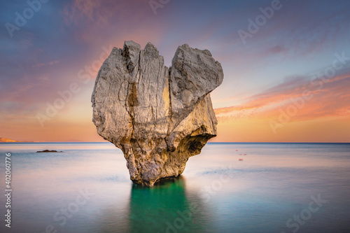Fototapeta Naklejka Na Ścianę i Meble -  Lonely rock sculpture at the shape of heart, Preveli, Crete, Greece