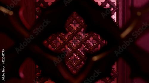 Seamless looping animation of a wooden screen in a confessional booth in church. photo