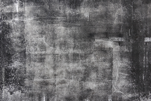 テクスチャー　墨で汚れたようなモルタルの壁　texture of old dirty wall  photo