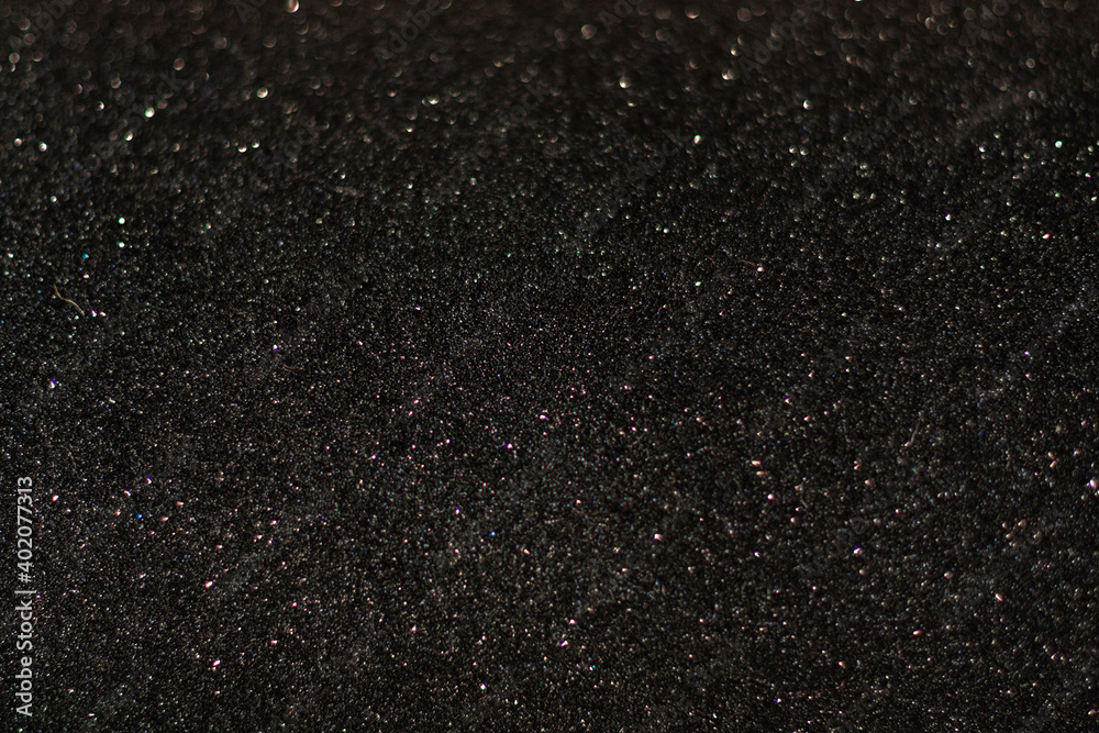 Shiny black glitter texture background stock images. Texture of black glitter shiny background. Abstract black shiny background with copy space for text.