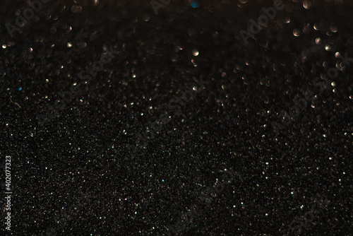 Shiny black glitter texture background stock images. Texture of black glitter shiny background. Abstract black shiny background with copy space for text.