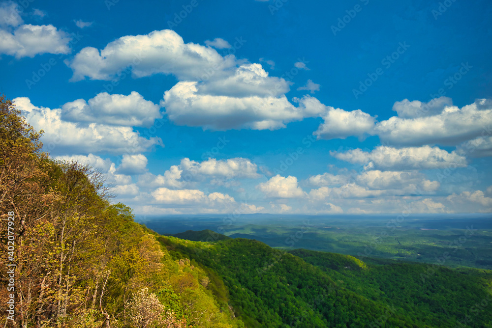 A beautiful blue sky and white clouds from the top of Whiteside's mountain, North Carolina, USA.