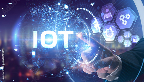 Wallpaper Mural Internet of things - IOT concept. Businessman offer IOT products and solutions. Young businessman  select the abstract chip with text IoT on the virtual display. Torontodigital.ca