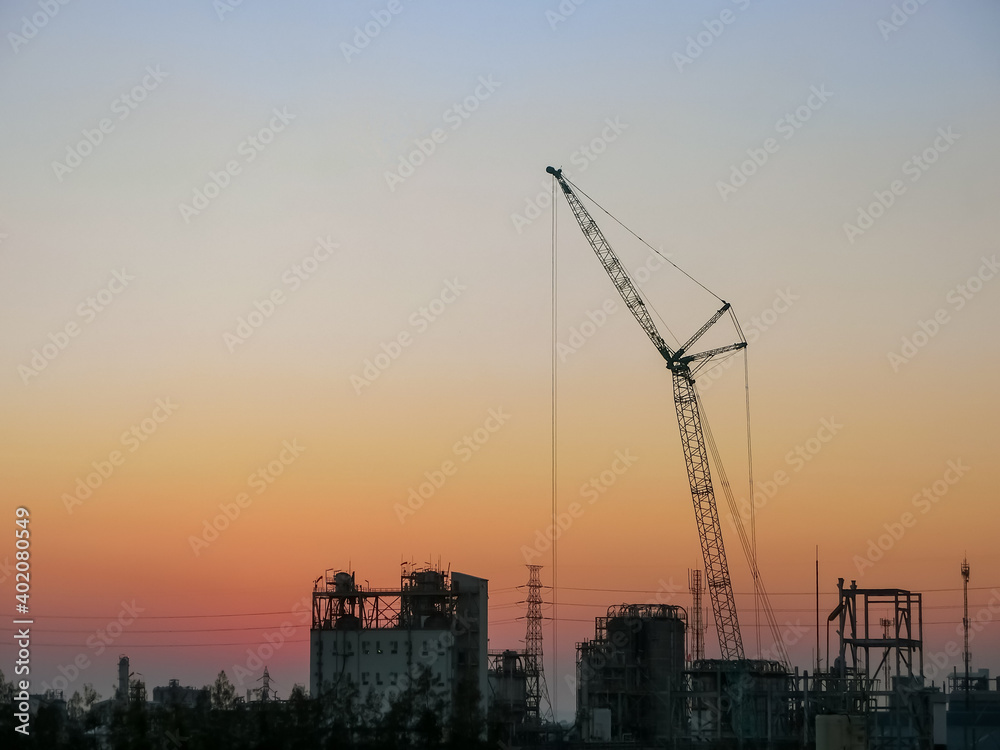 Petrochemical plant in morning right with copy space on top.