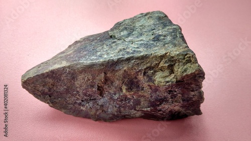 rocks and mineral from geological collection, serpentinite stone before polishing, ring of fire. photo