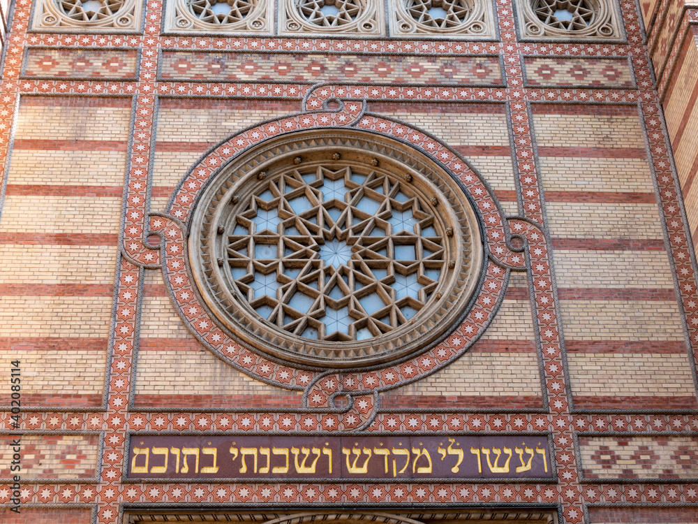 close up the front exterior window of the great synagogue in budapest, hungary