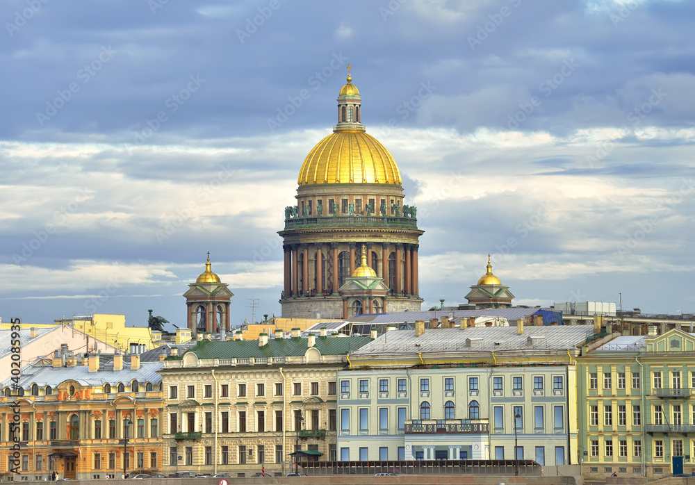 The dome of St. Isaac's Cathedral. Facades of houses on the English embankment, architecture of the XVIII-XIX centuries