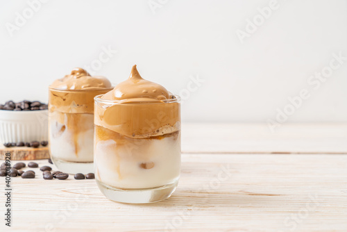 Iced Dalgona Coffee, a trendy fluffy creamy whipped coffee photo