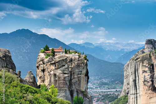 The Meteora is a rock formation in central Greece hosting one of the largest and most precipitously built complexes of Eastern Orthodox monasteries. photo