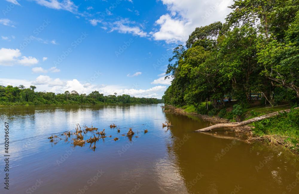 Wilderness River Scenery In Suriname South America. Calm River View Along The Bergendal Brokopondo District.
