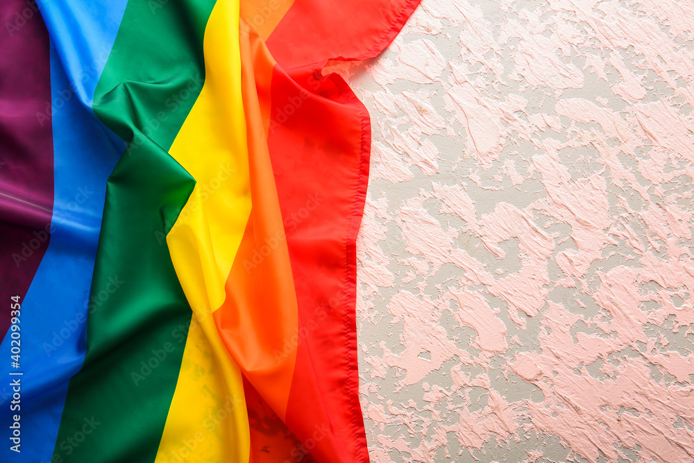 Rainbow LGBT flag on color background