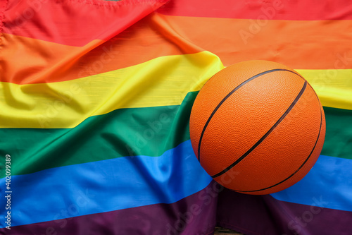 Fototapeta Naklejka Na Ścianę i Meble -  Basketball ball against lgbt rainbow flag
