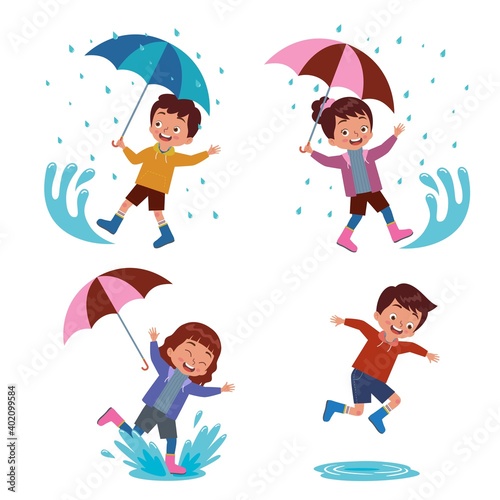 a boys and girl carrying an umbrella playing happily in a puddle of rain