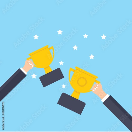 Hand Holding Trophies 