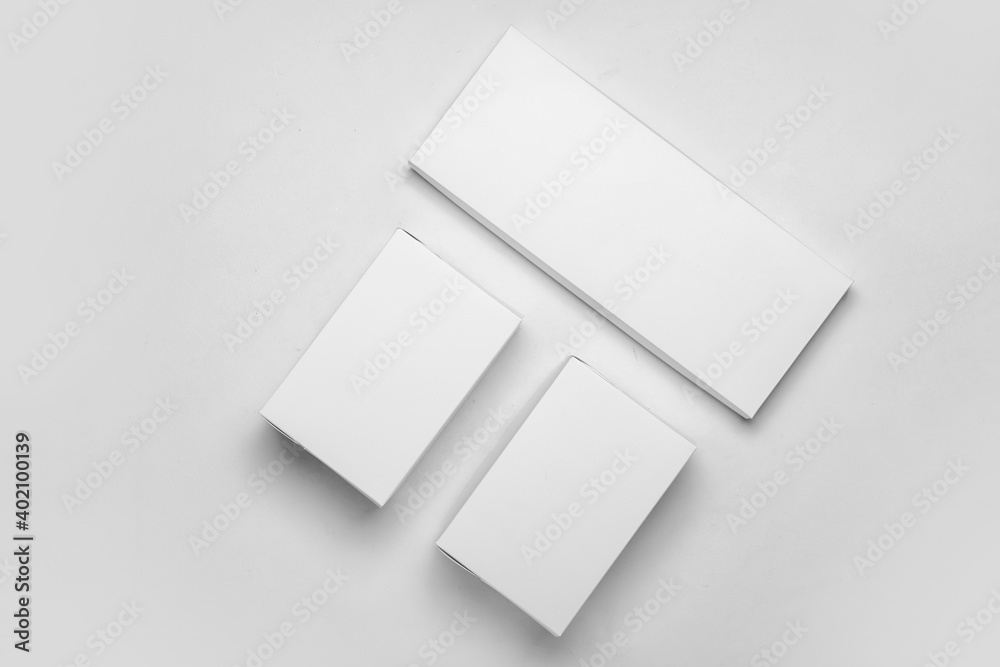 Blank cardboard boxes on light background Blank cardboard boxes on light background