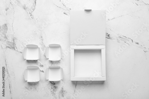 Blank cardboard boxes on li...
