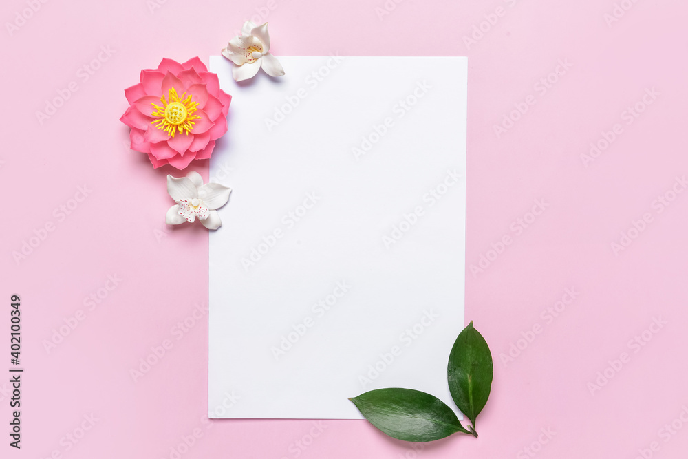 Blank paper sheet and flowers on color background Blank paper sheet and flowers on color background