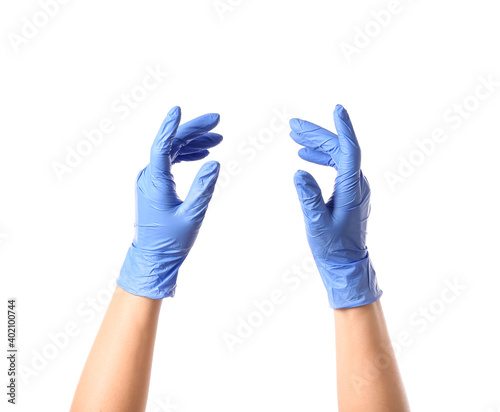 Hands in protective gloves on white background