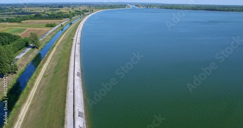 Aerial view of the concrete banks of a hydropower reservoir on the Drava River photo
