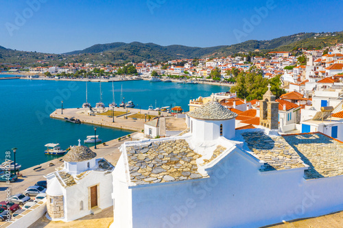 Fototapeta Naklejka Na Ścianę i Meble -  View of town and port at the island Skopelos, northern Sporades, Greece