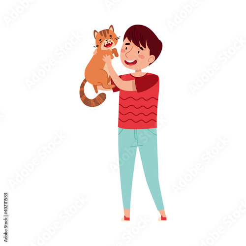 Young Boy Playing with His Cat Pet Holding It with Arms Vector Illustration