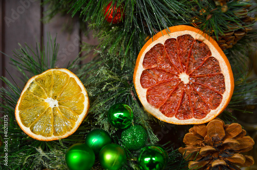 Christmas decoration with dried slices of oranges and grapefruit and pine cone