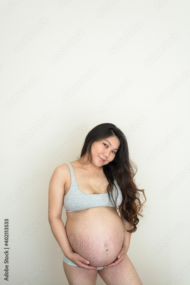 Happy pregnant young woman waiting for a child Happy pregnant young woman waiting for a child