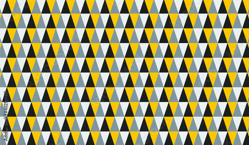 Beautifully arranged yellow gray and black triangles abstract background.
