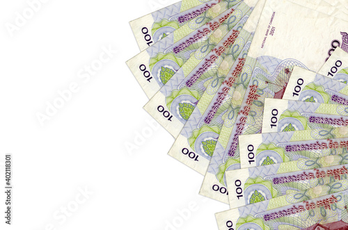 100 Cambodian riels bills lies isolated on white background with copy space. Rich life conceptual background photo