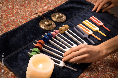 Fototapeta Set of colour tuning forks for sound healing