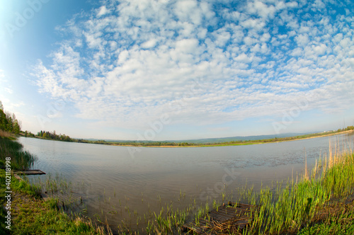 lake in forest in autumn with forest in the background