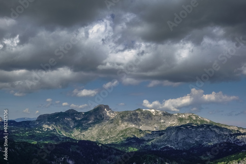 wonderful mountains and dark rainclouds on the sky