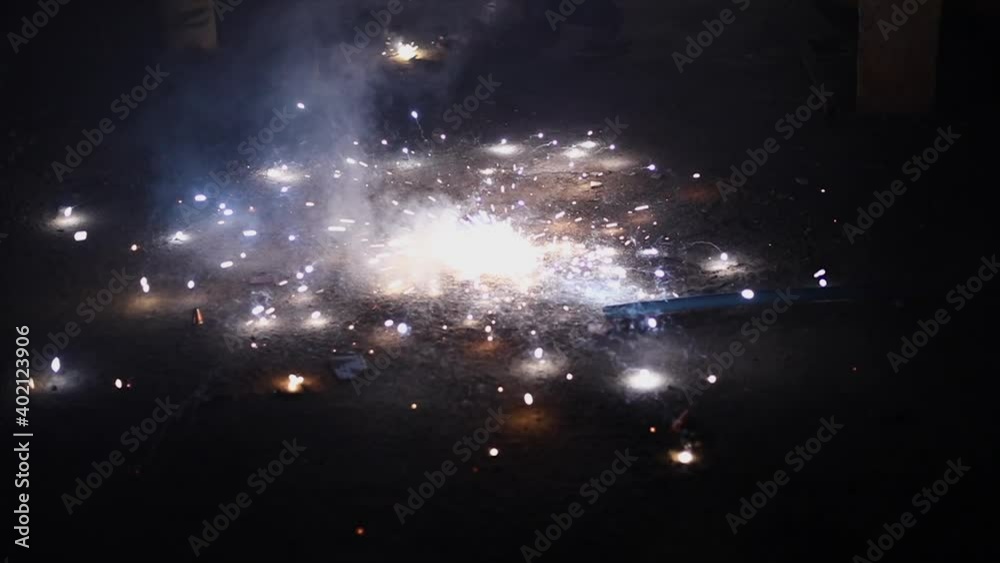 Ground spinner firecracker during Deepavali in India, Deepavali background, People enjoying Diwali by lighting firecrackers
