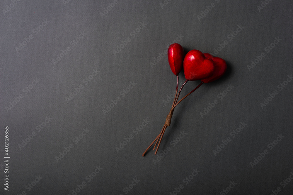 Photo of red heart over dark background with copyspace. Photo of red heart over dark background with copyspace.