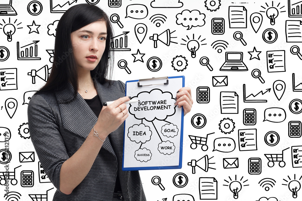 Business, technology, internet and network concept. Young businessman thinks over the steps for successful growth: Software development Business, technology, internet and network concept. Young businessman thinks over the steps for successful growth: Software development